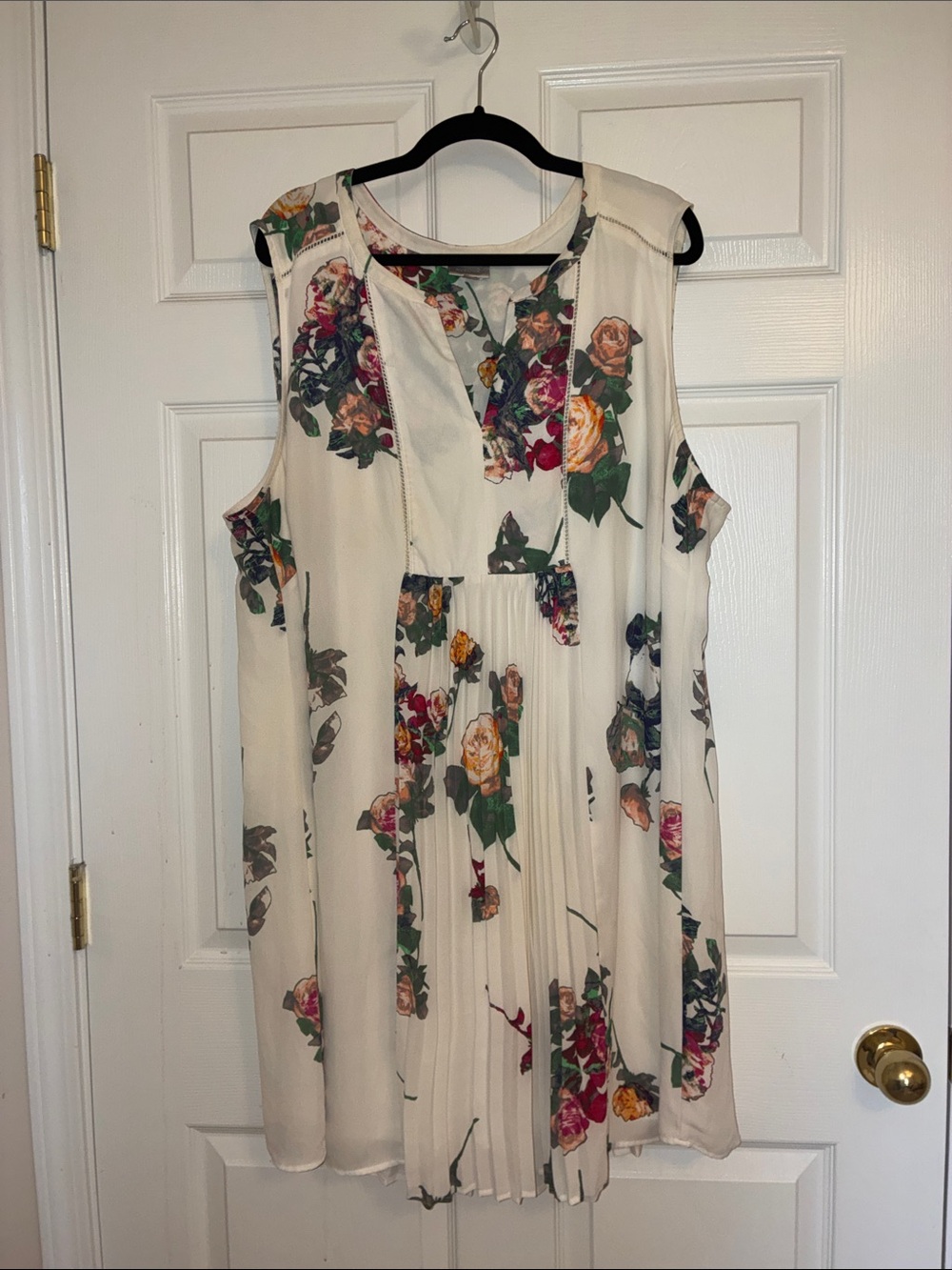 Floral Cream Dress with pink and peach Blooms. Pleated in front and back.